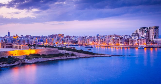 Malta nightview of Marsamxmett Harbour and Silema city, Valletta.